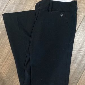 Junior’s black slacks